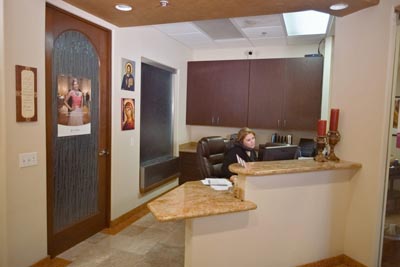 Desert Dental Spa coordinator scheduling an appointment for a patient