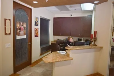Desert Dental Spa coordinator scheduling an appointment for a patient