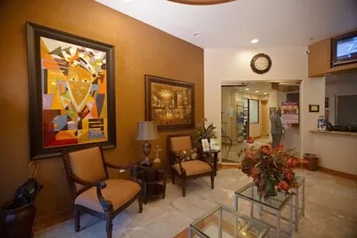 waiting room and front desk at Desert Dental Spa in Palm Desert, CA